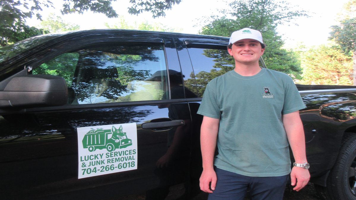 Carson Wiley owner of Lucky Services junk removal on the job in Charlotte NC