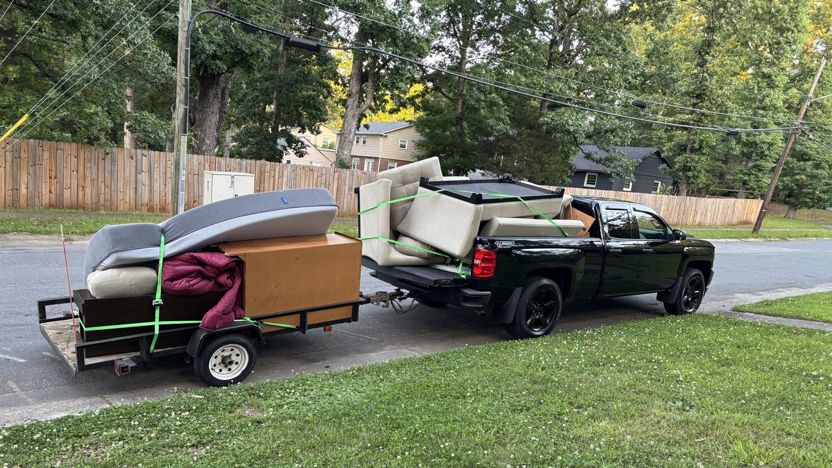 Lucky Services junk removal team working on a job in Charlotte NC